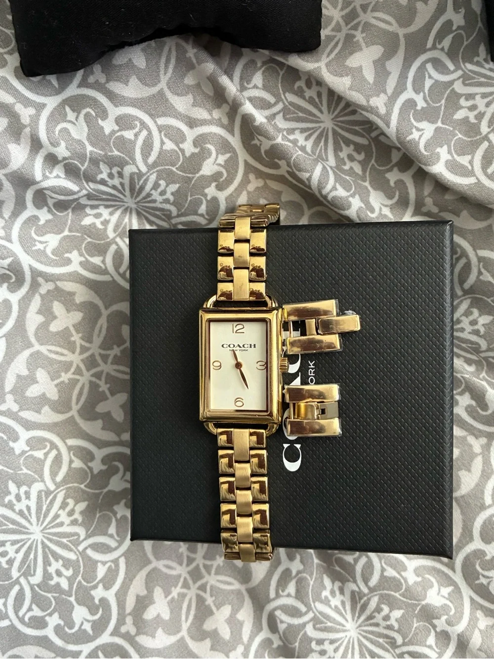 Coach gold watch